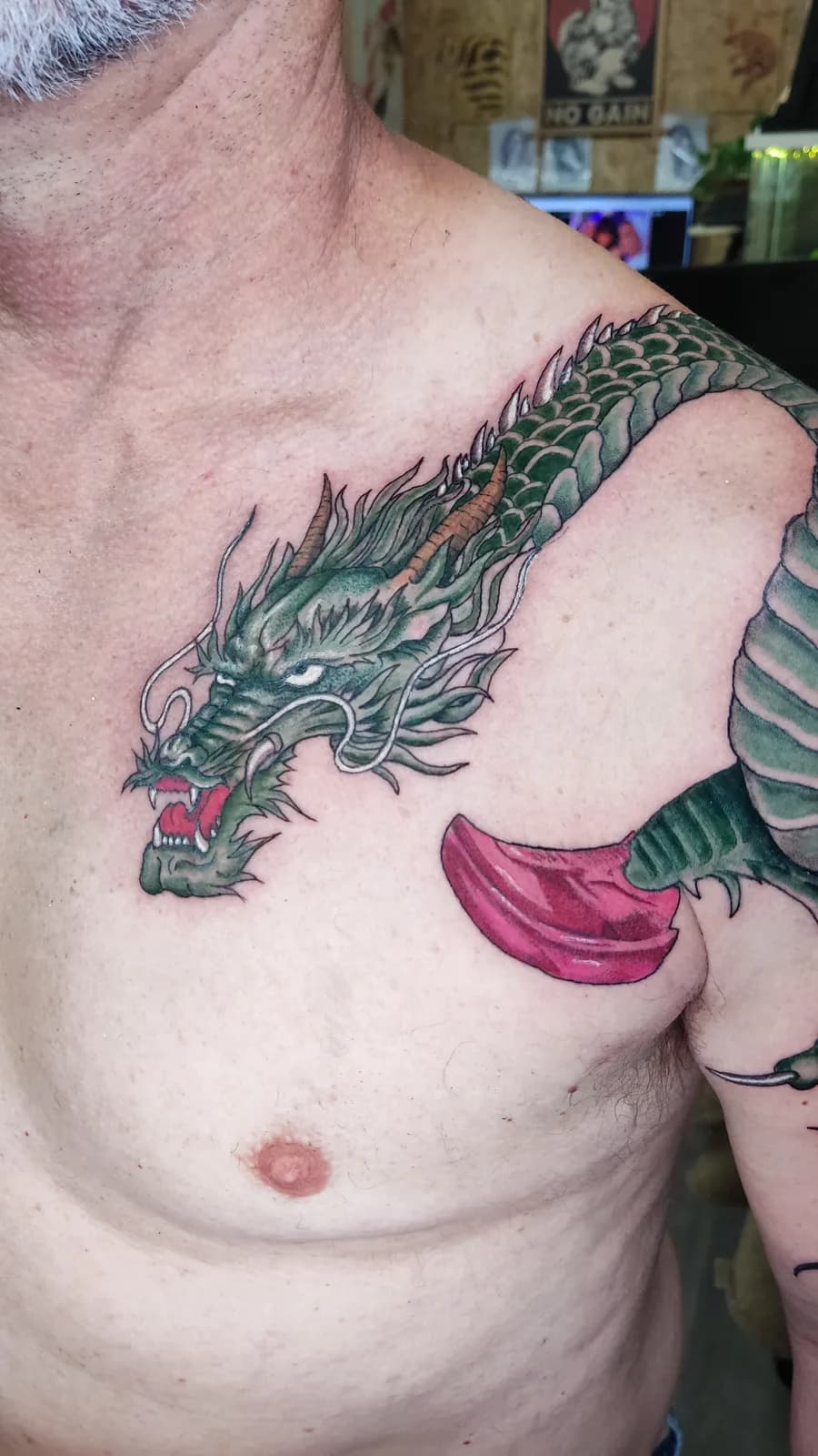 Japanese dragon in color across the chest